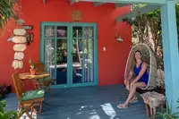 Relaxing vacation moment at Boardwalk Boutique Hotel Aruba, enjoying privacy and island charm after peak performance.