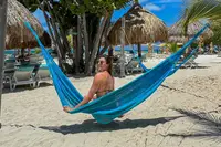 olympic-medalist-relaxing-aruba-boardwalk-boutique-hotel.jpg