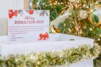 Holiday donation box at Boardwalk Boutique Hotel Aruba, supporting local community initiatives during the season of giving.