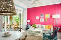 One-Bedroom Casita living room at Boardwalk Boutique Hotel Aruba with bright decor and open seating area.