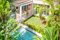 Private plunge pool and tropical garden outside a casita at Boardwalk Boutique Hotel Aruba.