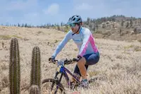 Mountain biking in Aruba near Boardwalk Boutique Hotel Aruba, highlighting the island’s outdoor sports landscape.