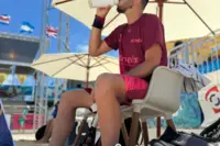 Relaxing between sports activities on Palm Beach in Aruba near Boardwalk Boutique Hotel Aruba.