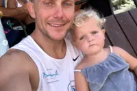 Family moment in Aruba with Luuk Loo, reflecting compassion and connection supported by Boardwalk Boutique Hotel Aruba.