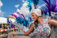 Carnival dancer in a colorful costume at an Aruba parade