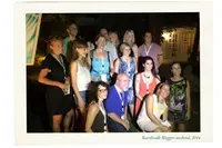 Group photo from Boardwalk Boutique Hotel Aruba Bloggers Weekend 2014 during an evening event.