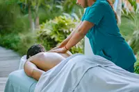 Outdoor massage on casita patio at Boardwalk Boutique Hotel Aruba