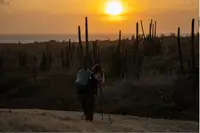 Sunset beach moment in Aruba, featured in the Boardwalk Boutique Hotel Aruba Artist in Residence story.