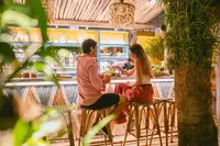 coco-cafe-couple-at-bar-boardwalk-boutique-hotel-aruba.jpg