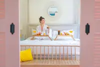 Breakfast in bed at Boardwalk Boutique Hotel Aruba sow summer