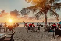 Barefoot dining on the beach 