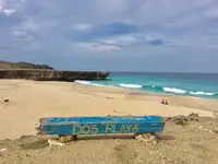 Dos Playa beach near Palm Beach in Aruba, part of Arikok National Park and easily visited from Boardwalk Boutique Hotel Aruba.