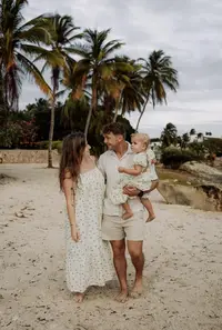 Family moment on Palm Beach in Aruba near Boardwalk Boutique Hotel Aruba, capturing connection, care, and island living.