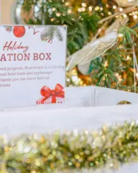 Holiday donation box at Boardwalk Boutique Hotel Aruba, supporting local community initiatives during the season of giving.