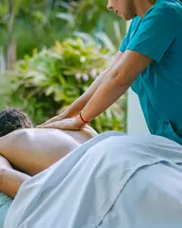 Outdoor massage on casita patio at Boardwalk Boutique Hotel Aruba